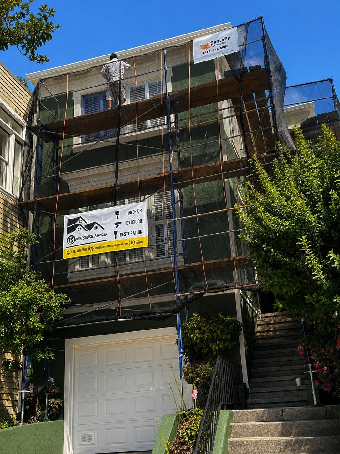 RS Professional Painting branded scaffolding on a Victorian restoration jobsite